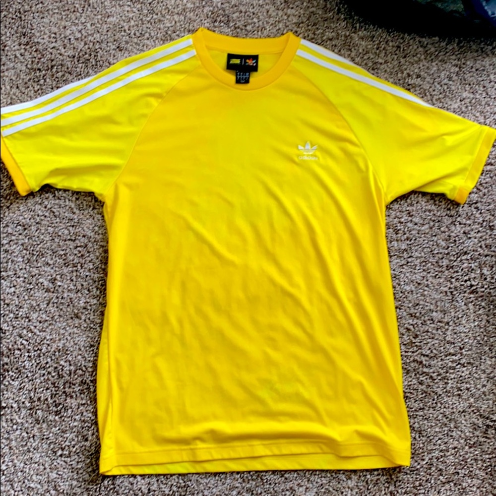Adidas Pharrell Williams Human Yellow shirt.